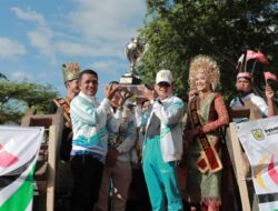 Pj Wali Kota Sambut Kepulangan Atlet POPDA dan Arak Piala Bergilir