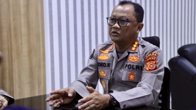 Kabid Humas Polda Aceh Kombes Pol. Joko Krisdiyanto, S.I.K., saat memberikan keterangan terkait ketersediaan stok BBM di Provinsi Aceh yang dipastikan aman, Kamis (5/3/2026).